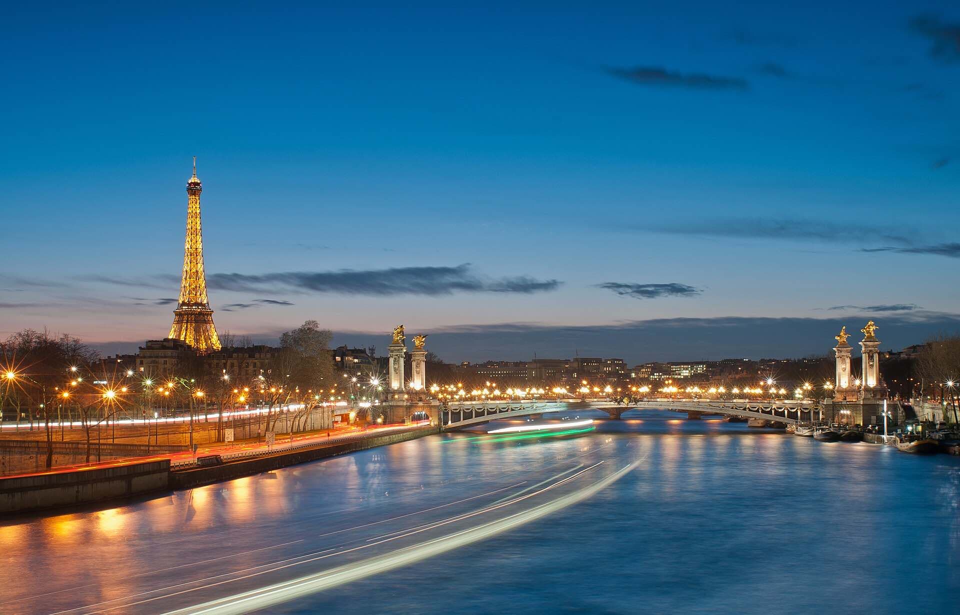 The Eiffel Tower and the Seine at blue hour