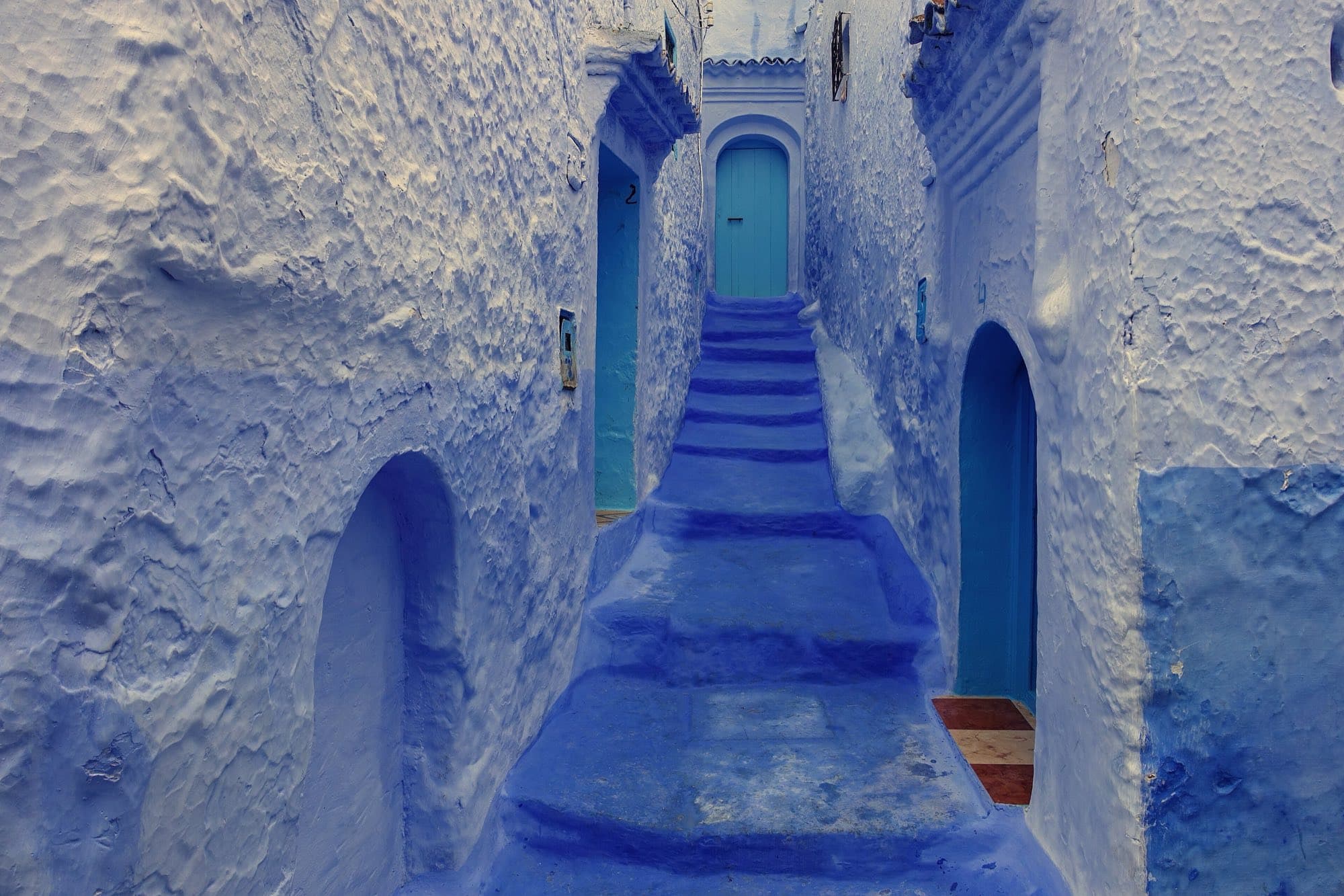 A blue-painted stairway alley in Chefchaouen