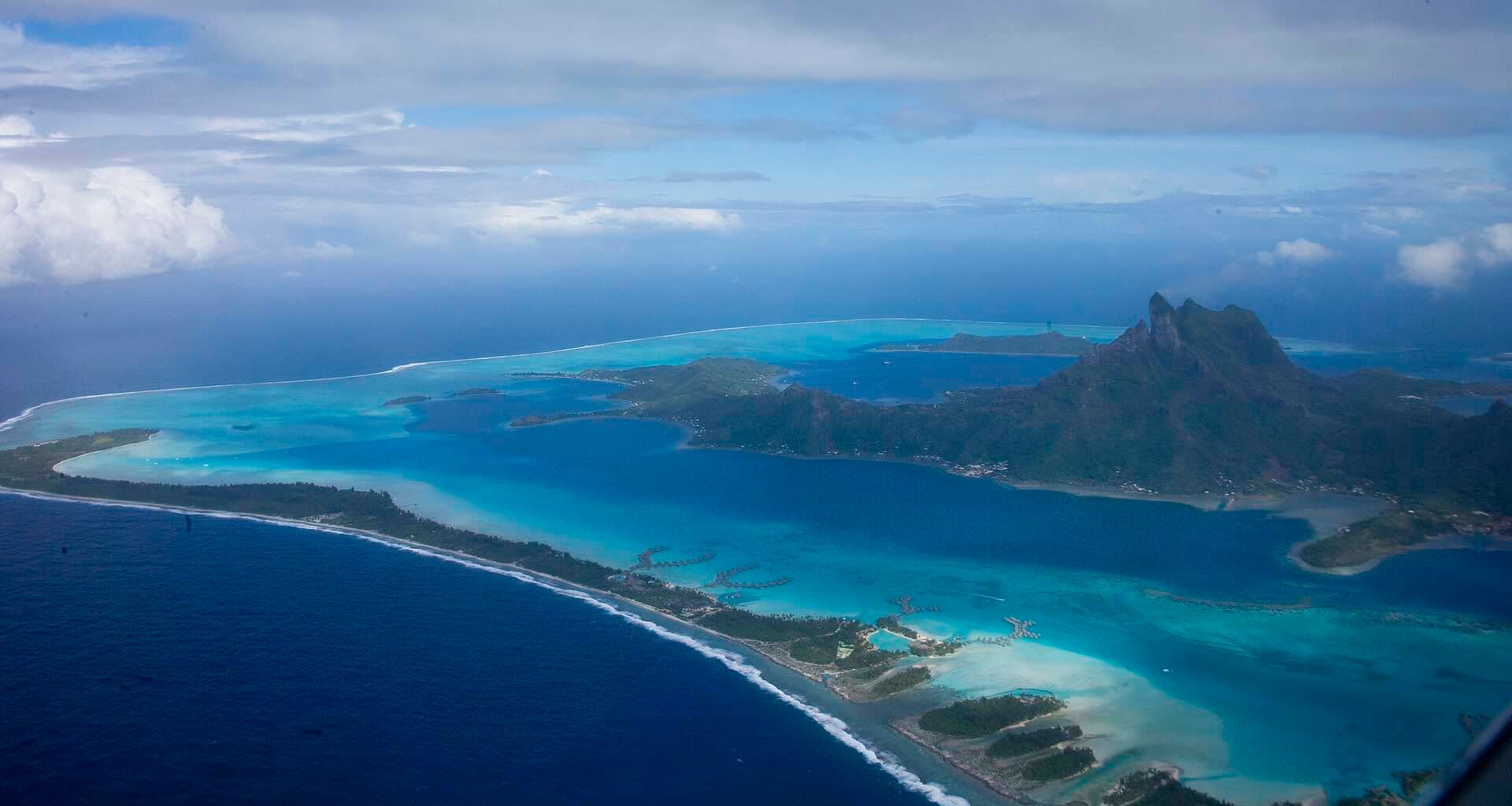 Bora Bora and its turquoise lagoon from the air